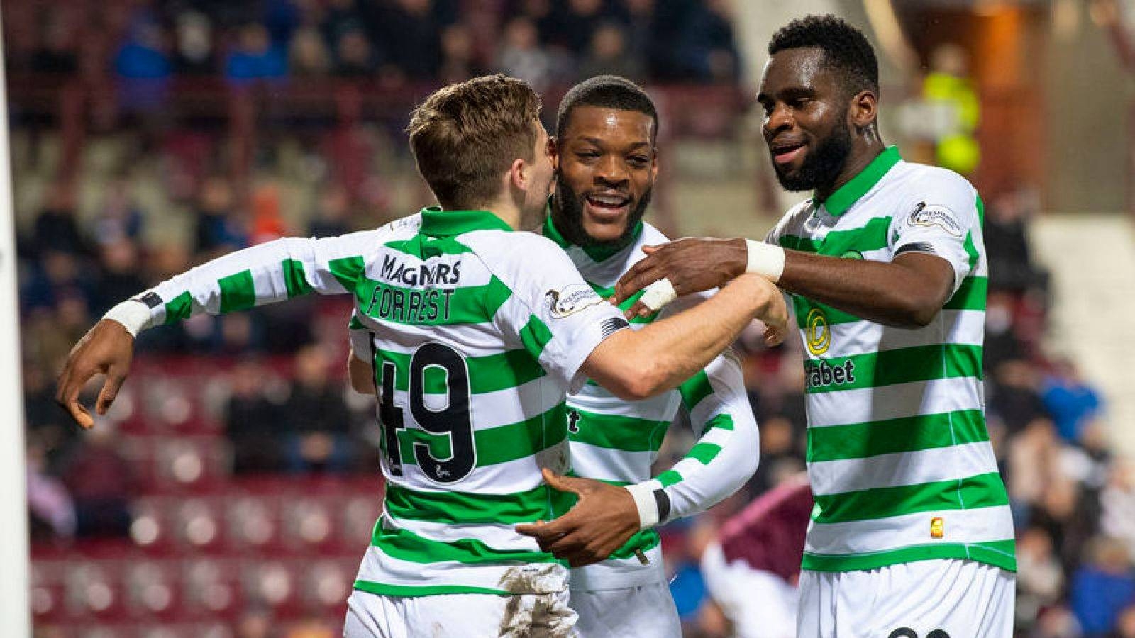 Celtic opens up a five-point lead at the top of the Scottish Premiership following a 2-0 win at struggling Hearts on Wednesday.