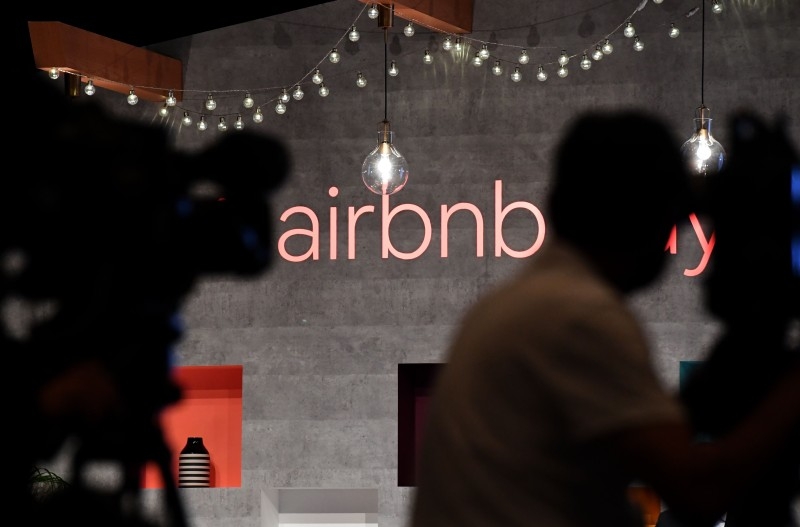 The US rental site Airbnb logo is displayed during the company's press conference in Tokyo in this June 14, 2018 file photo. — AFP