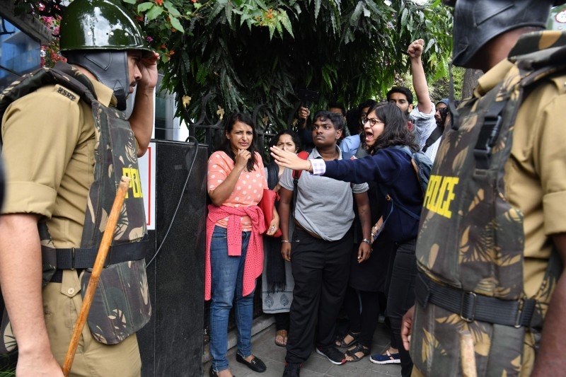 Protesters shout slogans during a demonstration against India's new citizenship law in Guwahati, Assam, on Thursday. — AFP