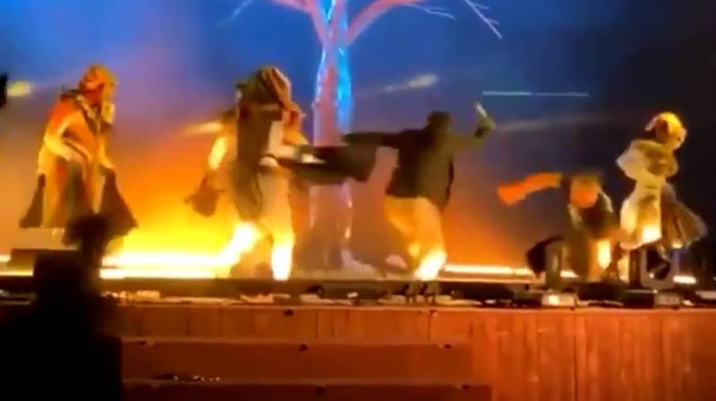 The man was seen stomping onto the stage to attack performers in theatrical costumes during a musical performance. (Supplied)
