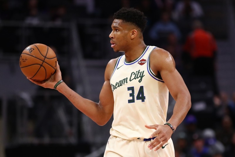 In this file photo taken on December 4, 2019 Giannis Antetokounmpo No. 34 of the Milwaukee Bucks plays against the Detroit Pistons at Little Caesars Arena in Detroit, Michigan. Giannis Antetokounmpo scored 32 points as the Milwaukee Bucks defeated LeBron James and the Los Angeles Lakers 111-104 to claim the best record in the NBA on Thursday. — AFP