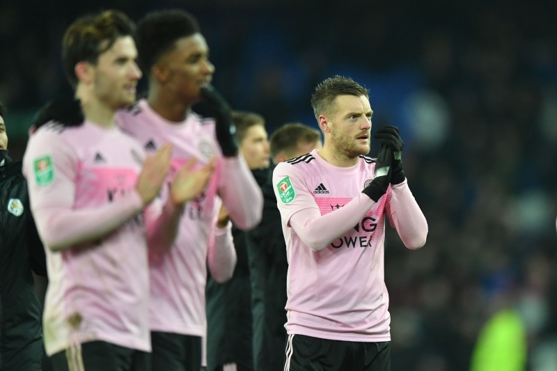 Leicester City's English striker Jamie Vardy (R) and teammates applaud supporters as they celebrate their win on the pitch after the English League Cup quarterfinal football match against Everton at Goodison Park in Liverpool, north west England. — AFP
