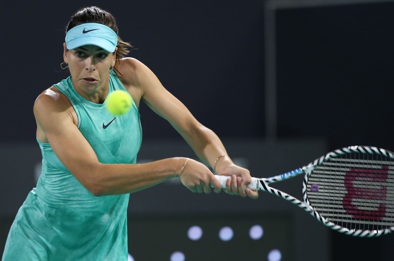 Maria Sharapova of Russia serves during her match with Ajla Tomljanovic of Australia (unseen) at the Mubadala World Tennis Championship at Zayed Sports City in Abu Dhabi on Thursday. — AFP