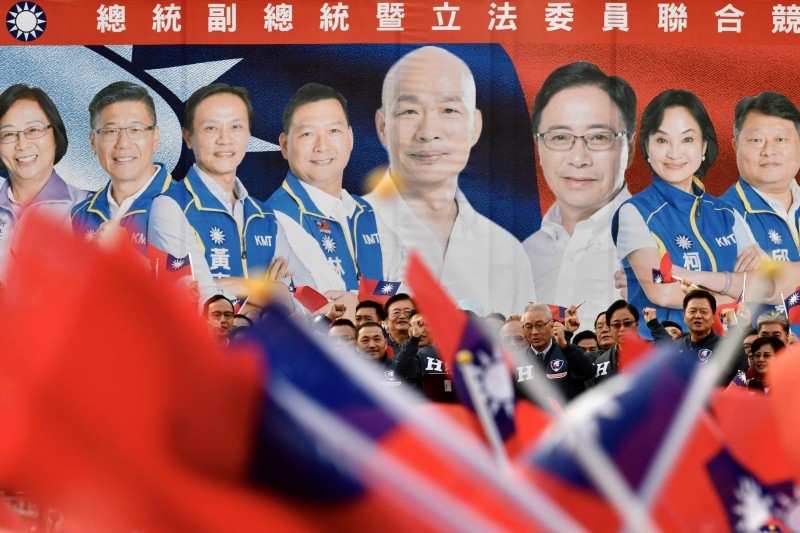 This picture taken on December 3, 2019 shows Taiwan's President and 2020 presidential candidate Tsai Ing-wen clapping during an election campaign event at the Jienan Taoist temple in Pingzhang district in Taoyuan. -AFP