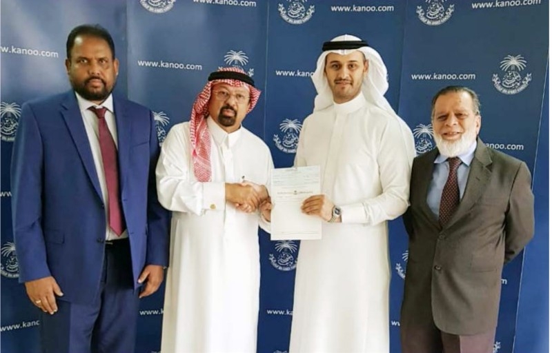 Marketing and PR Executive of YBA Kanoo Jeddah Sultan Al Yazeedi handing over sponsorship check to JCA Chairman Dr. Faiz Al Abideen in presence of  Aijaz Khan (President) and A. A. Merchant (JCA).