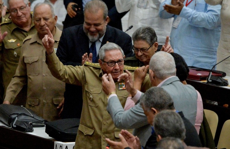 Newly appointed Cuban Prime Minister Manuel Marrero Cruz (C), attends the closing of the Fourth Regular Session of the National Assembly of Popular Power in its IX Legislature at the Convention Palace in Havana, on Saturday. -AFP