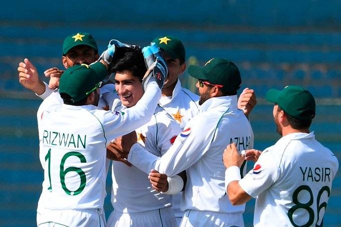Pakistan players celebrate after leaving the Sri Lanka second innings in tatters in the Karachi Test on Sunday.