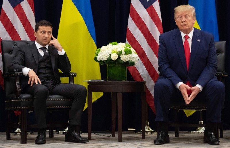 - AFP PICTURES OF THE YEAR 2019 - 

US President Donald Trump and Ukrainian President Volodymyr Zelensky looks on during a meeting in New York on September 25, 2019, on the sidelines of the United Nations General Assembly. -AFP