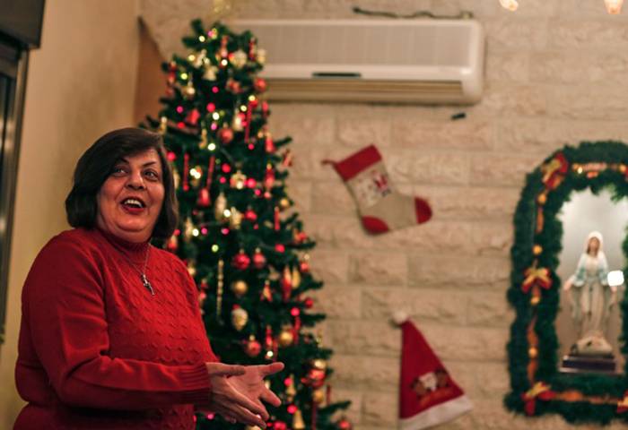 Hanadi Missak, a 48-year-old Christian woman, speaks during an interview in her house in Gaza City on Sunday. — AFP
