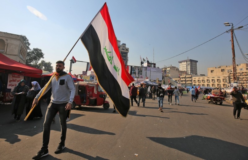 Iraq demonstrators gather at Tahrir square in central Baghdad on Monday. -AFP