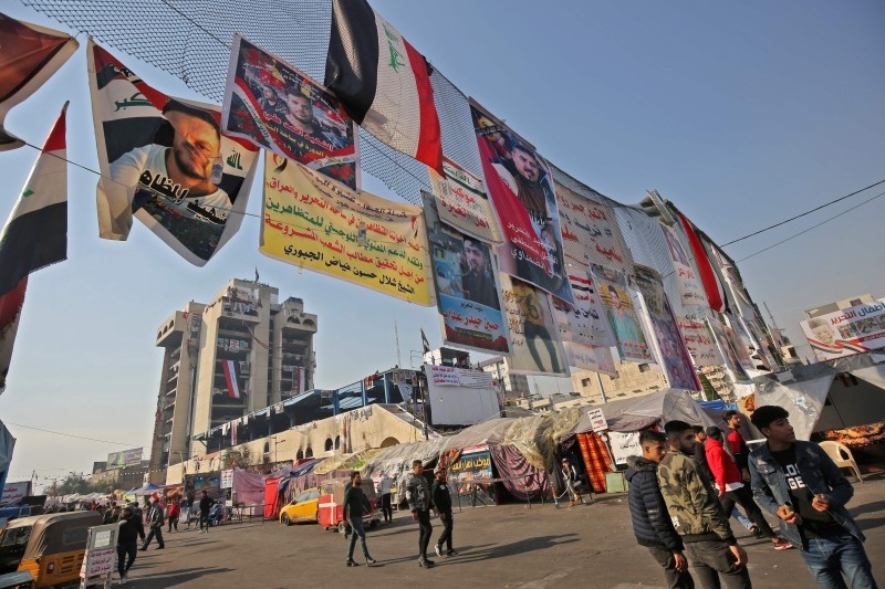 Iraq demonstrators gather at Tahrir square in central Baghdad on Monday. -AFP