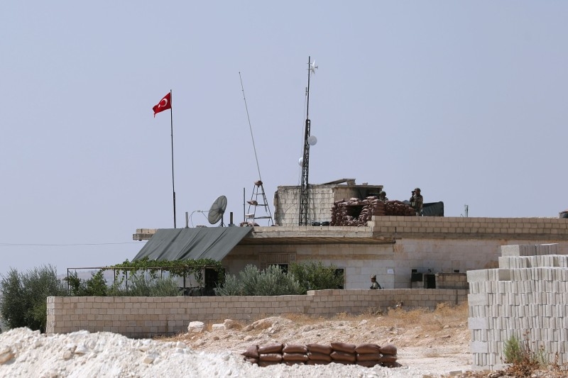  In this file photo taken on September 12, 2019, a Turkish military convoy heads towards an observation point near the town of Maar Hitat in Syria's northern Idlib province. -AFP