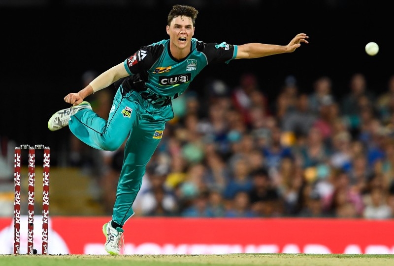 BRISBANE, AUSTRALIA - JANUARY 27:  Mitchell Swepson of the Heat bowls during the Big Bash League match between the Brisbane Heat and the Melbourne Renegades at The Gabba on January 27, 2018 in Brisbane, Australia.  (Photo by Ian Hitchcock/Getty Images)