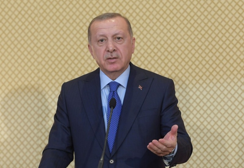 Turkish President Recep Tayyip Erdogan gestures as he speaks during a joint press conference with his Tunisian counterpart, not seen, at the presidential palace in Carthage, east of the capital Tunis, on Wednesday. — AFP