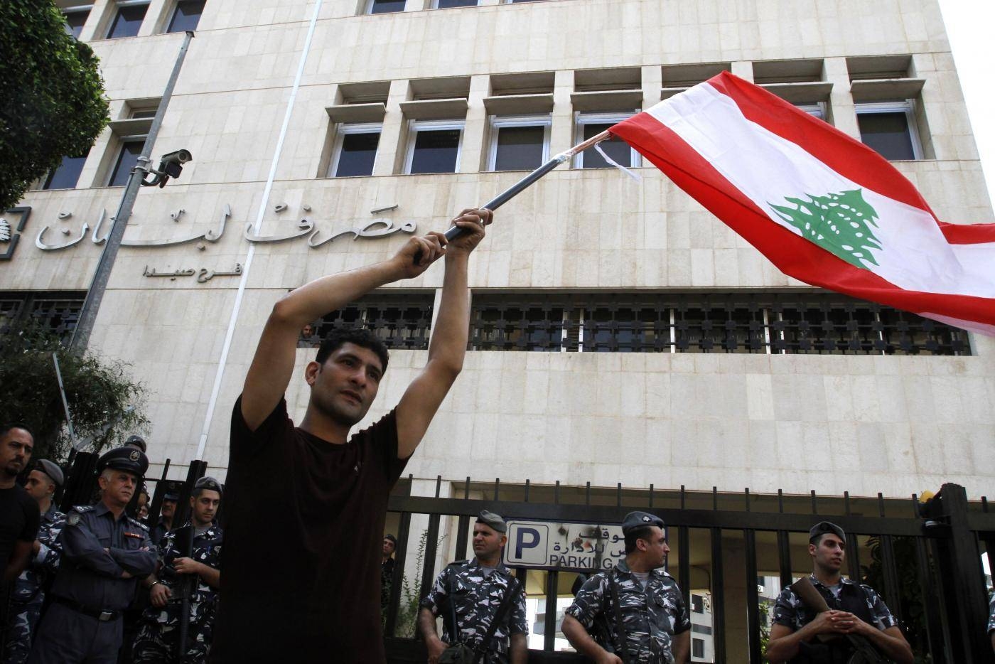 A Lebanese protester takes part in an anti-government demonstration in front of the central bank building in the southern Lebanese city of Sidon in this Oct. 28, 2019 file photo. — AFP