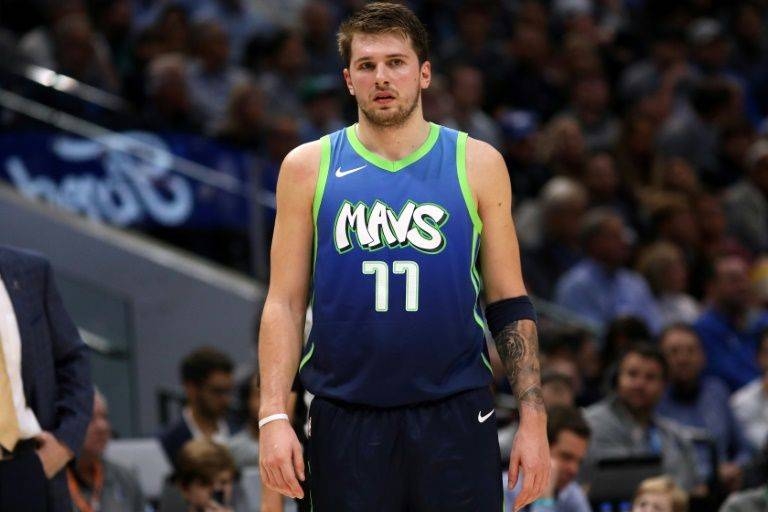 Luka Doncic returned from a four-game injury absence to score 24 points in the Dallas Mavericks' 102-98 NBA victory over the San Antonio Spurs. — AFP 