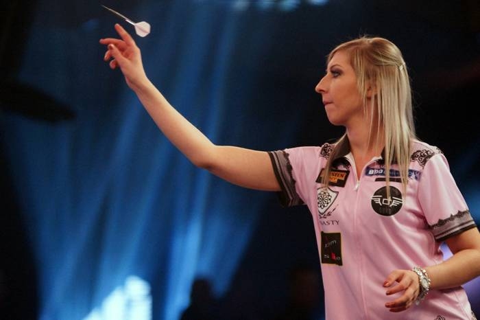 File photo shows Fallon Sherrock in action. Sherrock saw her historic run of victories at the world darts championship ended with a 4-2 defeat by Chris Dobey on Friday.
