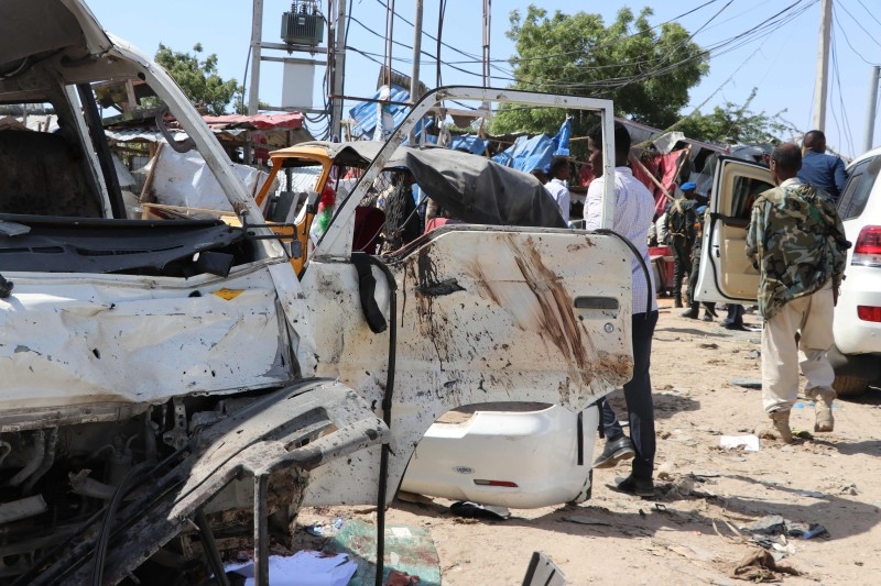 A minibus that was damaged during a car bomb that exploded in Mogadishu that killed more than 20 people is seen in Mogadishu on Saturday. -AFP