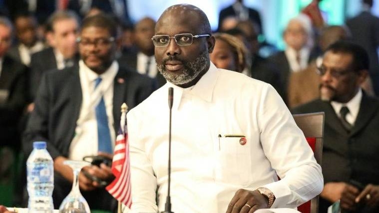 Liberian President George Weah is under growing pressure from the opposition over his handling of the country's economic crisis. -AFP 