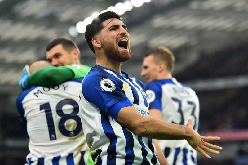 Brighton's Iranian midfielder Alireza Jahanbakhsh celebrates after Brighton's Dutch midfielder Aaron Mooy scores his team's second goal during the English Premier League football match against Bournemouth at the American Express Community Stadium in Brighton, southern England on Saturday. — AFP