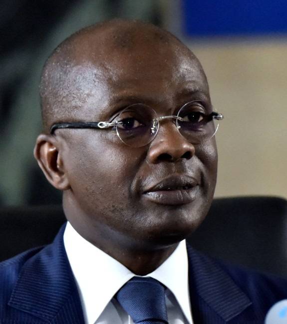 Ivorian State prosecutor Richard Adou speaks during a press conference at Abidjan's courthouse, in Abidjan, on December 26, 2019. Ivory Coast prosecutors on December 23, 2019, issued an arrest warrant for presidential candidate Guillaume Soro who aborted a planned return by diverting his flight to Ghana as security forces stormed his party headquarters in Abidjan. -AFP