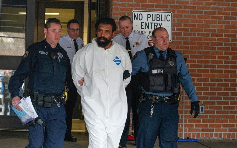  Suspect in Hanukkah celebration stabbings Thomas Grafton, 37 years old from Greenwood Lake,  leaves the Ramapo Town Hall in Airmont, New York after being arrested on Sunday. -AFP
