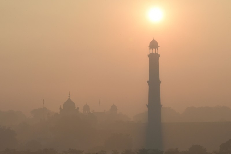 This picture taken on December 6, 2019 shows heavy smog conditions around Badshahi Mosque in Lahore. -AFP