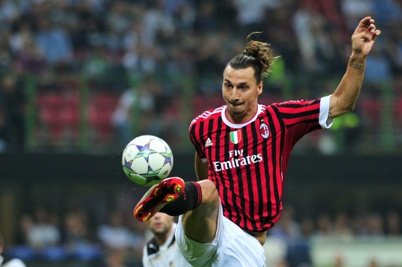 AC Milan's Swedish forward Zlatan Ibrahimovic jumps for the ball against Viktoria Plzen during their Champions League match-day 2 , Group D match at San Siro Stadium in Milan, Italy, in this Sept. 28, 2011 file photo. — AFP