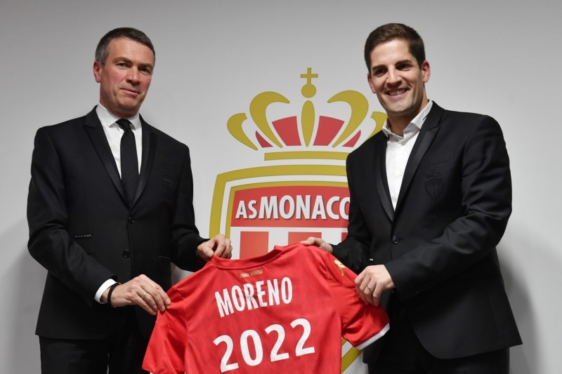 AS Monaco's Spanish coach Robert Moreno, right, and and Monaco's Russian vice club president Oleg Petrov pose after a press conference at the Louis II Stadium in Monaco on Monday. — AFP