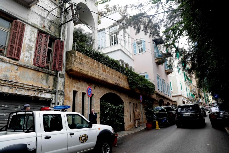 Members of the press wait in front of a house identified by court documents as belonging to former Nissan chief Carlos Ghosn in a wealthy neighborhood of the Lebanese capital Beirut on Tuesday.  -AFP