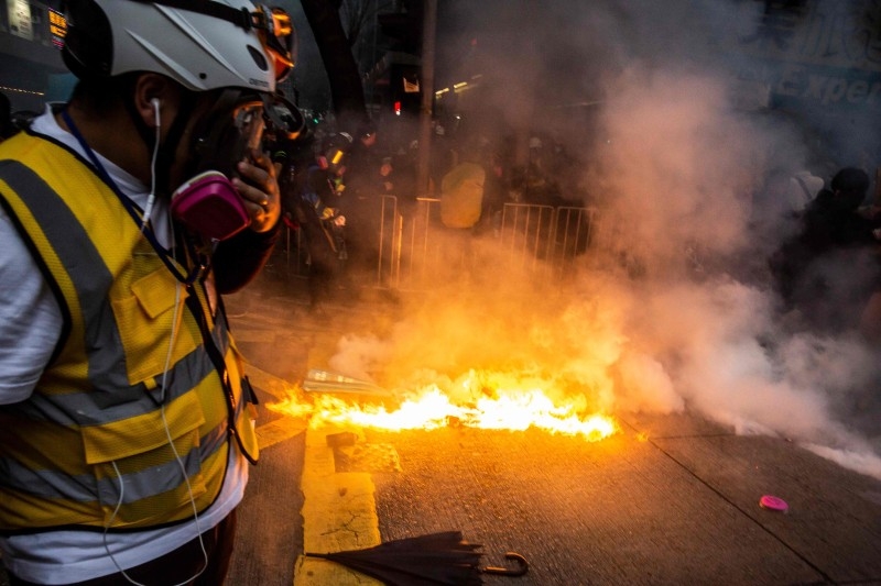 People take part in a pro-democracy march in Hong Kong on January 1, 2020.  Tens of thousands of protesters marched in Hong Kong during a massive pro-democracy rally on New Year's Day, looking to carry the momentum of their movement into 2020.
 / AFP / ISAAC LAWRENCE
