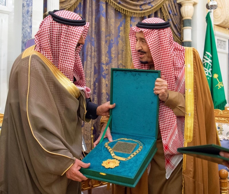 Custodian of the Two Holy Mosques King Salman being presented with Abu Bakr Al-Siddiq Necklace of the First Class during a reception in Riyadh on Wednesday. — SPA