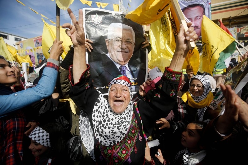 Supporters of the Palestinian Fatah movement take part in a rally marking the 55th foundation anniversary of the political party in Gaza City on Wednesday. — AFP