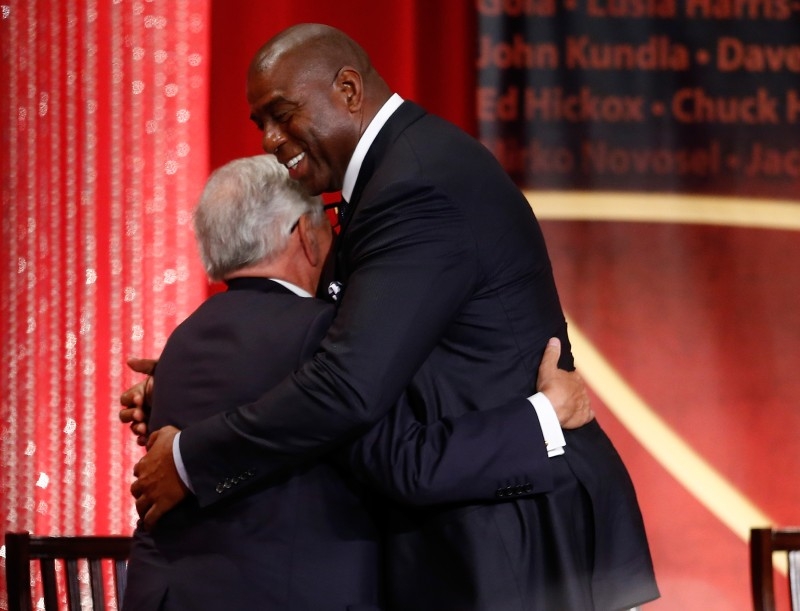 In this file photo taken on Aug. 8, 2014 David Stern is hugged by Earvin 'Magic' Johnson during the 2014 Basketball Hall of Fame Enshrinement Ceremony at Symphony Hall in Springfield, Massachusetts. Magic Johnson and Michael Jordan were among the NBA legends stunned by the death on Wednesday of former league commissioner David Stern following a brain hemorrhage he suffered last month. — AFP