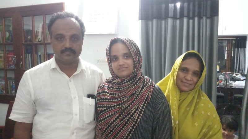Aysha Renna with her father Abdul Rasheed and mother Qamarunnisa at their home in Kaloth, near Kondotty, when she visited them during the Christmas vacation.