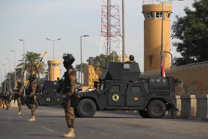 Iraqi counter-terrorism forces stand guard in front of the US embassy in the capital Baghdad on Thursday. — AFP