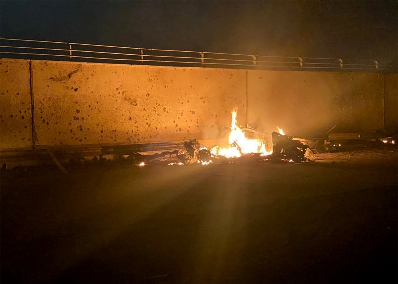 A picture published by the media office of the Iraqi military's joint operations forces on their official Facebook page shows a destroyed vehicle on fire following a US strike on Friday, 2020 on Baghdad international airport road in which top Iranian commander Qasem Soleimani was killed along with eight others, including the deputy head of Iraq's powerful Hashed Al-Shaabi paramilitary force. — AFP