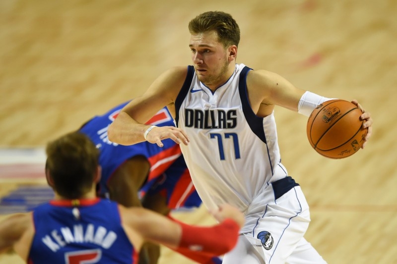 In this file photo taken on Dec. 12, 2019 Dallas Mavericks' Slovenian point guard Luka Doncic controls the ball, during their NBA Global Games match against the Detroit Pistons at the Mexico City Arena, in Mexico City. Slovenian guard Luka Doncic edged reigning NBA Most Valuable Player Giannis Antetokounmpo of Milwaukee for the overall lead in early NBA All-Star Game voting results released on Thursday. — AFP