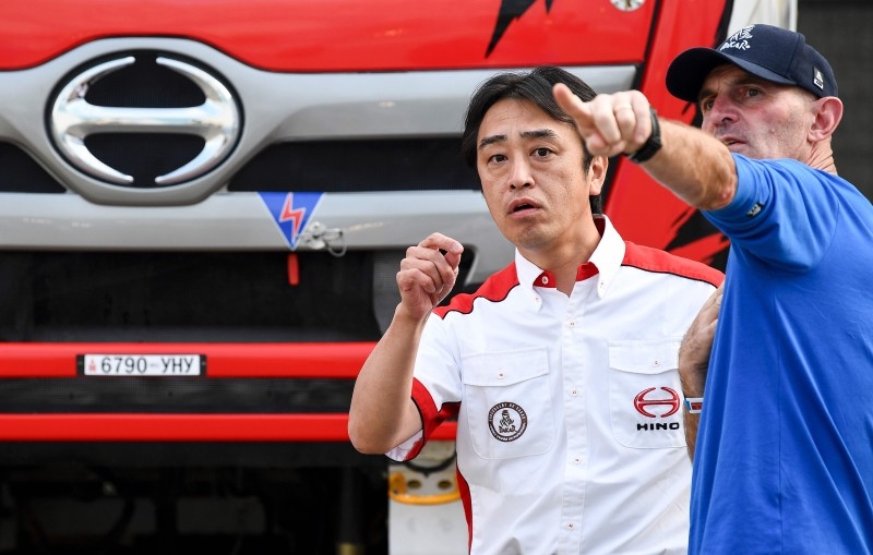 Japanese truck driver Teruhito Sugawara of the Sugawara team (L) arrives for a technical check-up in the Saudi Red Sea port city of Jeddah on Thursday ahead of the event which starts on Jan. 5 and lasts until Jan. 17.  — AFP