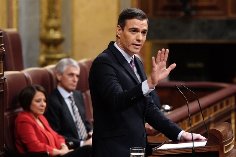 Spanish caretaker prime minister, socialist Pedro Sanchez, speaks during the first day of a parliamentary investiture debate to vote for a premier at the Spanish Congress (Las Cortes) in Madrid on Saturday. Spain's Socialist leader Pedro Sanchez, seeking a leftist political alliance to resume office as prime minister, today made dialogue in restive Catalonia an 