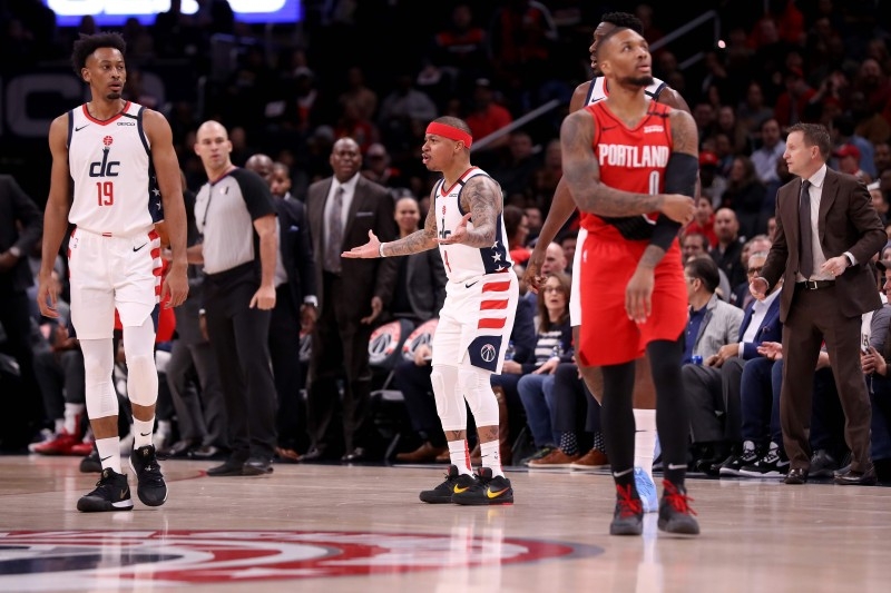 In this file photo taken on Jan. 3, 2020, Isaiah Thomas No. 4 of the Washington Wizards reacts after being ejected during the first quarter against the Portland Trail Blazers at Capital One Arena. Washington Wizards guard Isaiah Thomas was fined $25,000 by the NBA on Sunday for inappropriate contact with a referee in a 122-103 home loss to Portland on Friday. — AFP