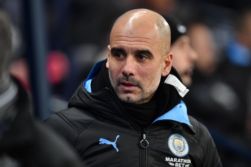 Manchester City's Spanish manager Pep Guardiola arrives for the English FA Cup third round football match against Port Vale at the Etihad Stadium in Manchester, north west England, on Jan. 4, 2020. — AFP