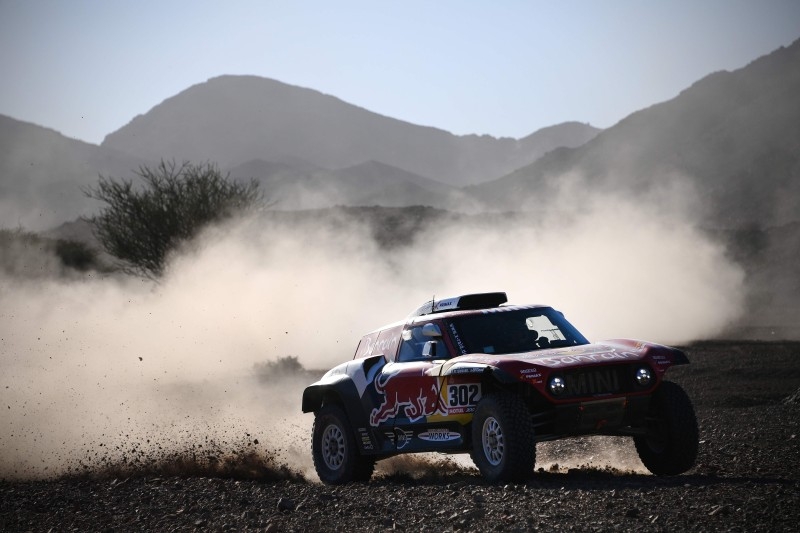 Mini's driver French Stephane Peterhansel and his co-driver Portuguese Paulo Fiuza compete during the Stage 2 of the Dakar 2020 between Al Wajh and Neom, Saudi Arabia, on Monday. — AFP