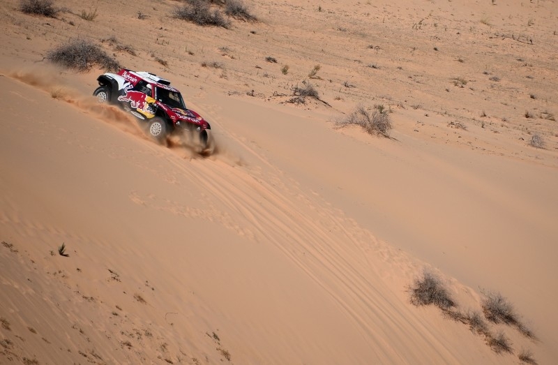 Mini's Spanish drivers Carlos Sainz of Spain and co-driver Lucas Cruz of Spain compete during the Stage 5 of the Dakar 2020 between AlUla and Ha'il on Thursday. — AFP