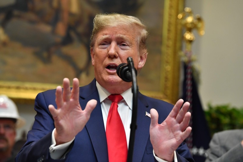 US President Donald Trump speaks to the press on Thursday, at the White House in Washington, DC. — AFP