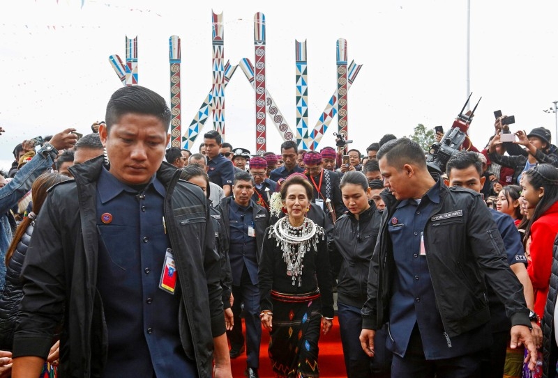 Myanmar State Counsellor Aung San Suu Kyi (C) attends the 72nd Kachin State day ceremony in Myitkyina, upper Myanmar on Friday. — AFP