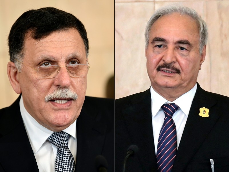 This combination of pictures created on Sunday shows Libya's UN-backed Prime Minister Fayez Al-Sarraj speaking during a press conference in the capital Tunis on August 7, 2017 and Libyan General Khalifa Haftar speaking during a press conference on September 18, 2017 at Carthage Palace in Tunis. -AFP