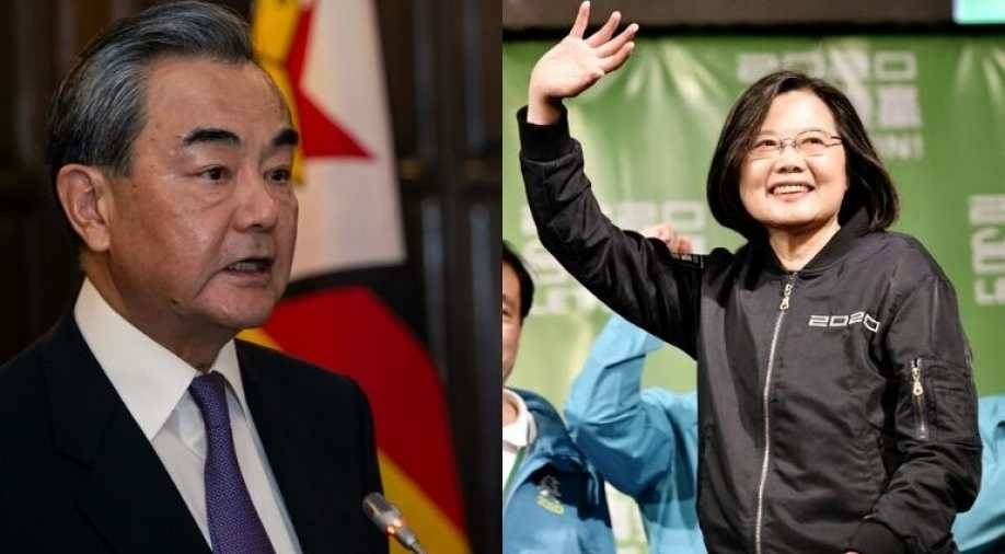 

Wang Yi and Tsai Ing-wen. -AFP
