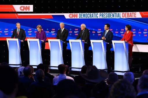 (L-R) Democratic presidential hopefuls billionaire-philanthropist Tom Steyer, Massachusetts Senator Elizabeth Warren, Former Vice President Joe Biden, Vermont Senator Bernie Sanders, Mayor of South Bend, Indiana, Pete Buttigieg and Minnesota Senator Amy Klobuchar speak during the seventh Democratic primary debate of the 2020 presidential campaign season co-hosted by CNN and the Des Moines Register at the Drake University campus in Des Moines, Iowa on Tuesday. -AFP