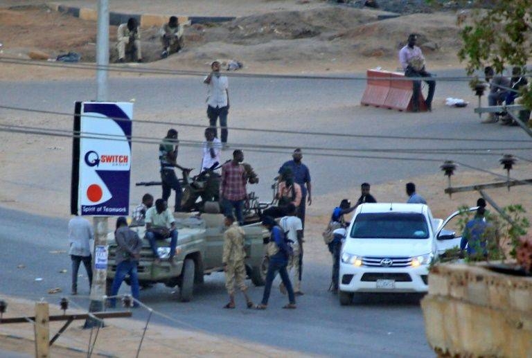 The military said two of its soldiers were killed when the regular army and a paramilitary group stormed the bases, while doctors close to a protest umbrella group said three civilians were killed by gunfire near a base in southern Khartoum. — AFP